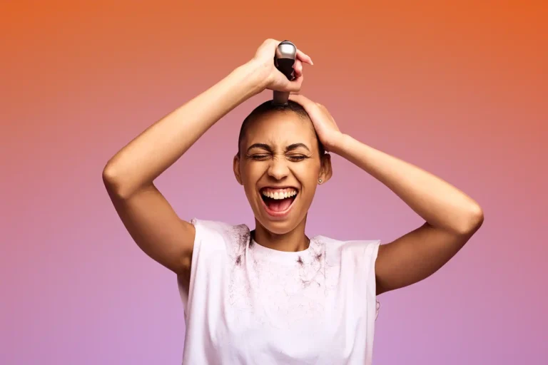 Female shaving off her hair for charity large